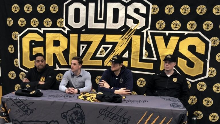 Newly minted Olds Grizzlys Head Coach Tyson Soloski speaks to the media at an introductory press conference on April 2, 2025. L-R: Owner and GM Moe Jamal, Head Coach Tyson Soloski, Assistant Coach Dylan Olsen, Assistant Coach Mitch Visser. (Galen Hartviksen, mymountainviewnow.com staff)