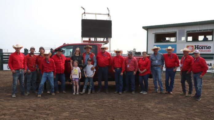 Jamie Laboucane and family along with outriders Hayden Motowylo, Kale Lajeunesse and the Bonnyville Ag Society Board. (mymountainviewnow.com staff)