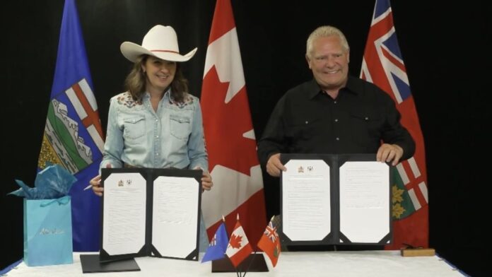 Alberta's Danielle Smith and Ontario's Doug Ford sign MOUs in Calgary on July 7, 2025. (Galen Hartviksen, mymountainviewnow.com staff)
