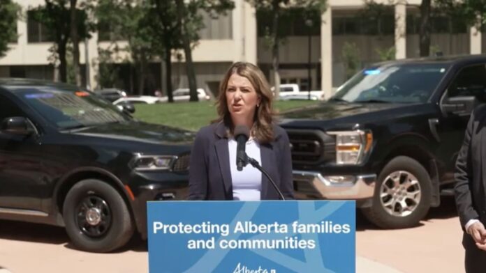 Premier Danielle Smith in Calgary on July 3, 2025 as the first chief of the Independent Agency Police Service is announced. (Galen Hartviksen, mymountainviewnow.com staff)