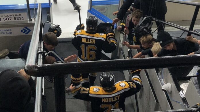 Hunter Motley and Rhett Miller hit the ice for warm ups ahead of the Olds Grizzlys home opener on September 20, 2025. (Galen Hartviksen, mymountainviewnow.com staff)