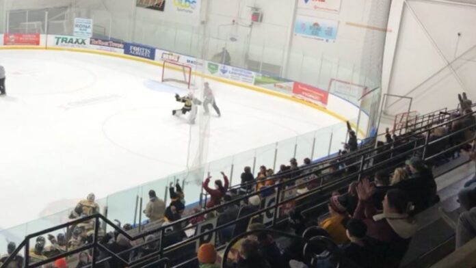 Olds Grizzlys goalie Connor Johnson celebrates after making the game winning save on November 22, 2025. (Galen Hartviksen, mymountainviewnow.com staff)