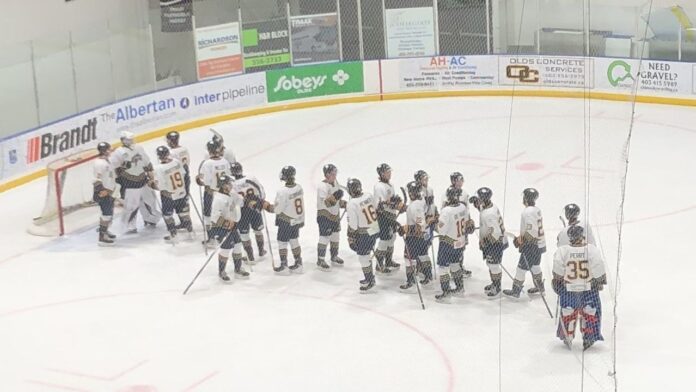 The Grande Prairie Storm wrap up a 3-2 win over the Grizzlys in Olds on December 17, 2025. (Galen Hartviksen, mymountainviewnow.com staff)