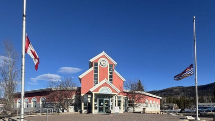 Tumbler Ridge Town Hall with flags at half-mast on Feb 11, 2026 | Photo by Tavi Dhillon, Vista News
