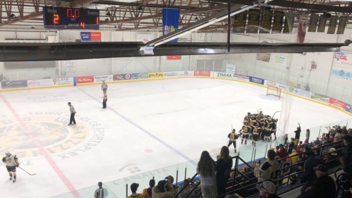 The Olds Grizzlys mob goaltender Cole Prelusky after the final save of a 2-1 shootout triumph over Bonnyville on February 13, 2026. (Galen Hartviksen, mymountainviewnow.com staff)