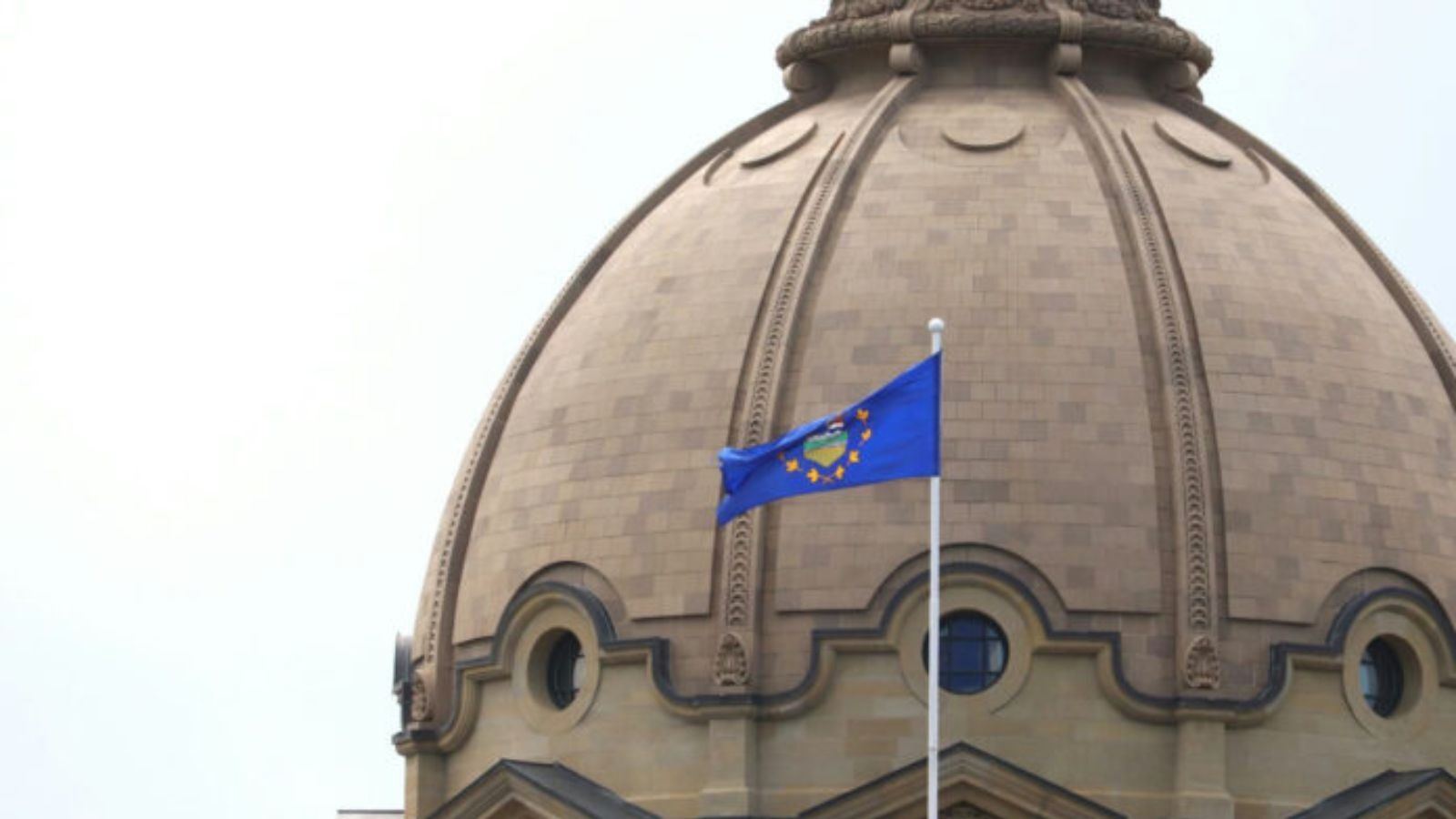 The Alberta flag flies at the legislature building in Edmonton on June 26, 2025. | John K. White photo