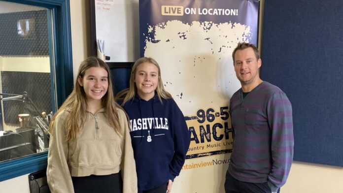 The Olds Junior Broncos visit 96.5 The Ranch prior to hosting Hockey Alberta's U15 Female B Provincials from March 27-29. L-R: Caydence Smyth, Callie Kemmere, Head Coach Jeff Smyth. (mymountainviewnow.com staff)