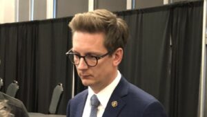 Nate Glubish listens to attendees following a Town Hall meeting in Olds on April 7, 2026. (mymountainviewnow.com staff)