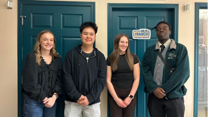 École Olds High School Leadership Students stop in at 96.5 The Ranch ahead of ASLC 2026. L-R: Abi Hallett, Andre Bombasi, Cadence Witcher, Mukulu Shamuu. (mymountainviewnow.com staff)