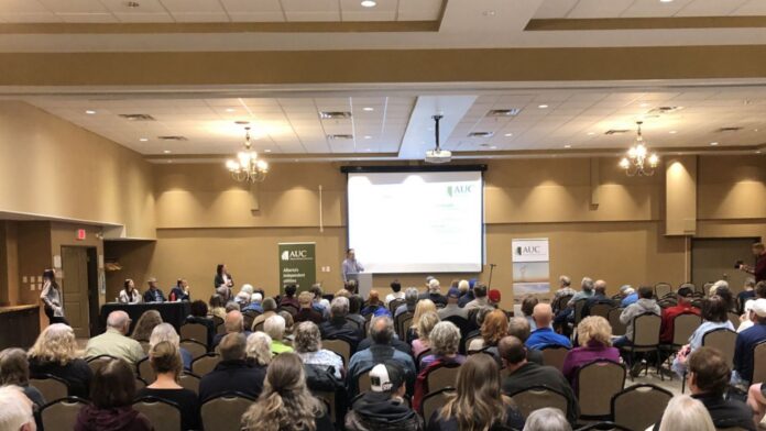 Victor Choy with the Alberta Utilities Commission makes a presentation during an information session in the Town of Olds on May 21, 2026. (mymountainviewnow.com staff)