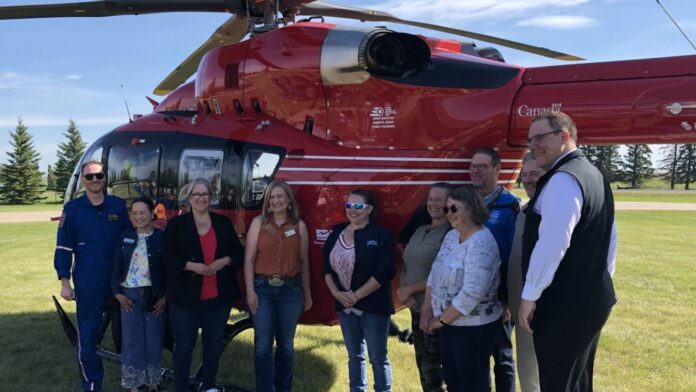 STARS Air Ambulance unveils Mountain View County logo on a helicopter on June 25, 2026. (mymountainviewnow.com staff)