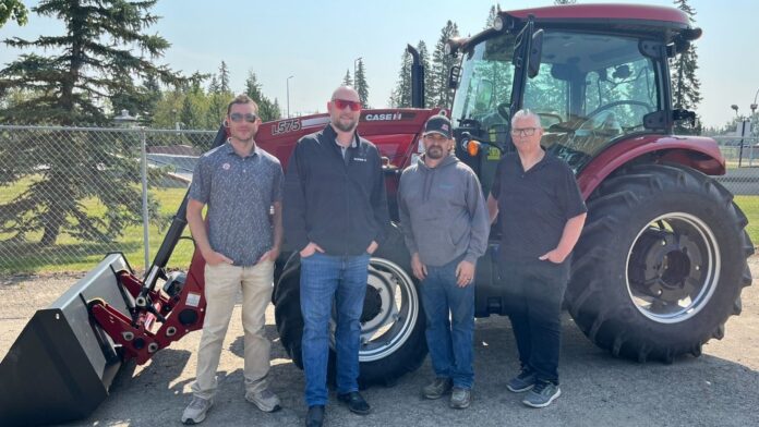 ORE's new Farmall 105A with L575 loader. (L-R: Hunter Ryckman, Salesman, Future AG; Brennan Wright, Branch/Sales Manager, Future Ag; Buck Thompson, Olds Regional Exhibition Operations Manager; Jason Hronek, Parts/Service Manager, Future Ag - Supplied, ORE)