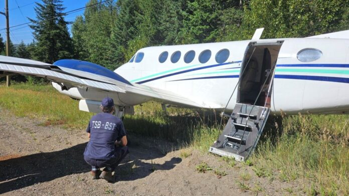 TSB Investigators on the scene of Thursday's plane crash in PG on Foothills Boulevard. Submitted by Transportation Safety Board of Canada.