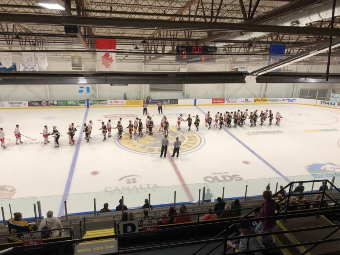 The Korea University Tigers and the Olds Grizzlys shake hands following their exhibition game on Sept2, 2026. (mymountainviewnow.com staff)